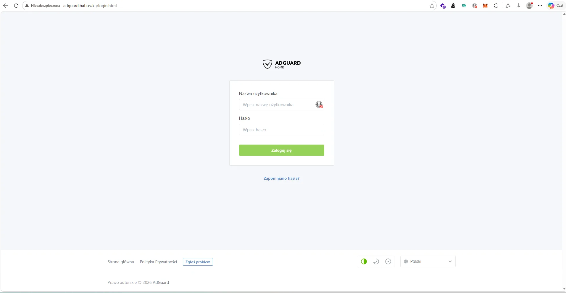 Przeglądarka z adresem adguard.babuszka/login.html otwierającym panel logowania AdGuard Home